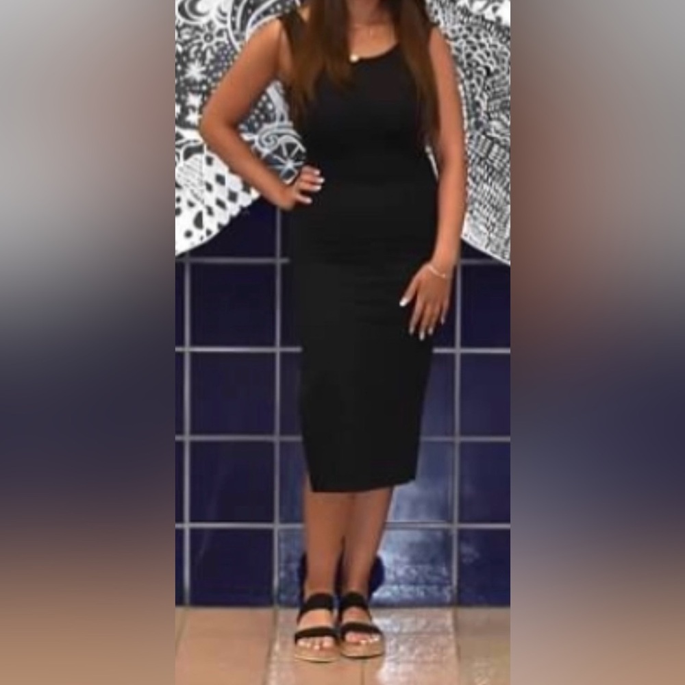 Elegant Black Sleeveless robbed bodycon type dress Size Medium